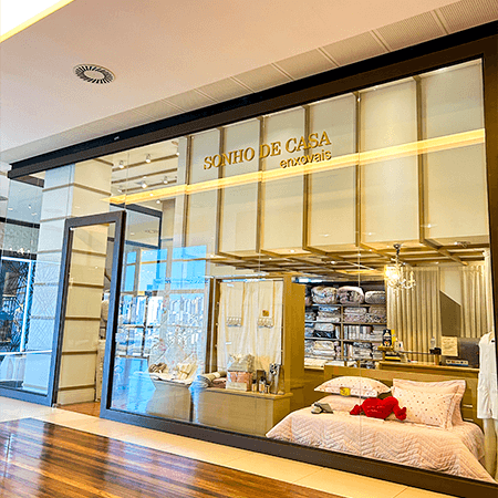 Logo da loja sonho de casa enxovais